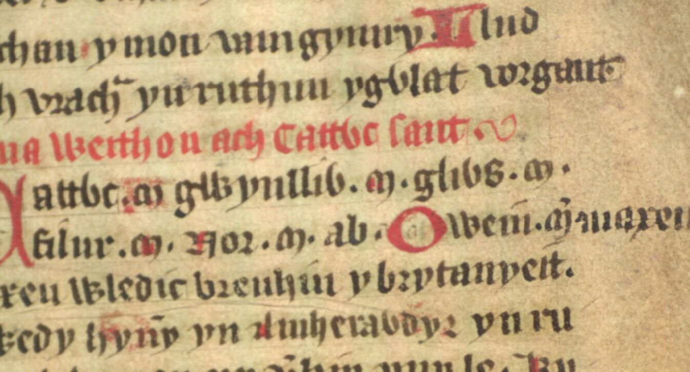 Jesus College MS 20, folio 34r, toont Glywys, de vader van koning Poulentus, aan het einde van de middelste regel